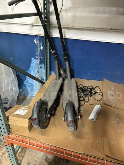 2 electric scooters and spare tire unknown condition