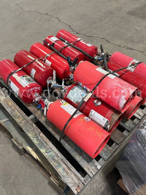 Used and full expired fire extinguishers.