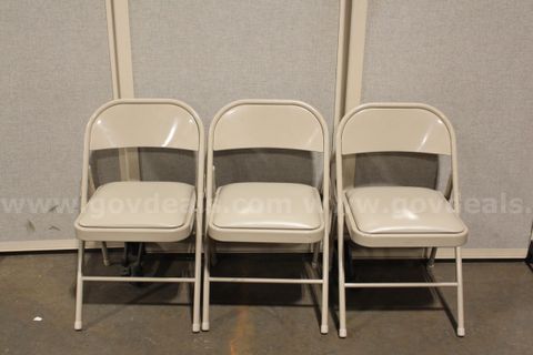 (3) Beige Folding Chairs With Cushions