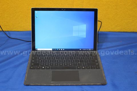(1) Microsoft Surface Pro 4 - Intel i5, 8GB RAM, 256GB Storage, OS: Windows 10, (1) Power Adaptor