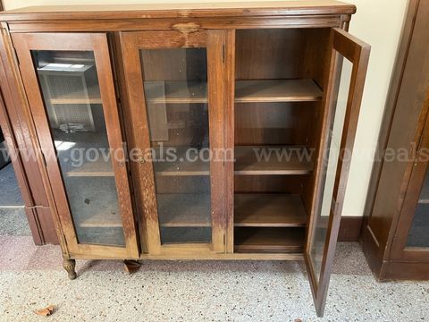 one bookshelf, glass front w/three doors (AGO-HYCA)