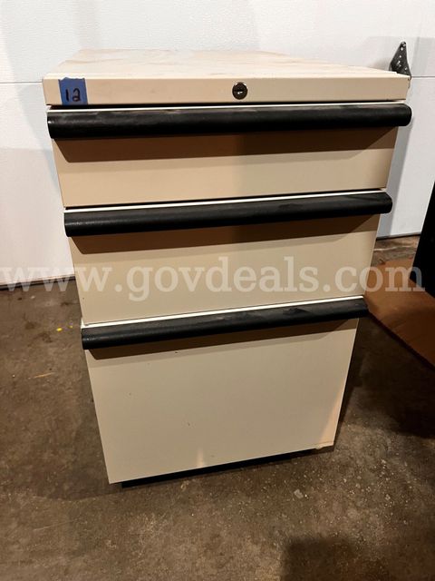 Three drawer file cabinet