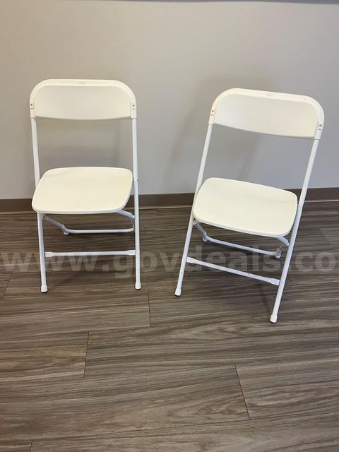 2 White Plastic Folding Chairs - LOCATED AT OUR CARMI, IL CAMPUS