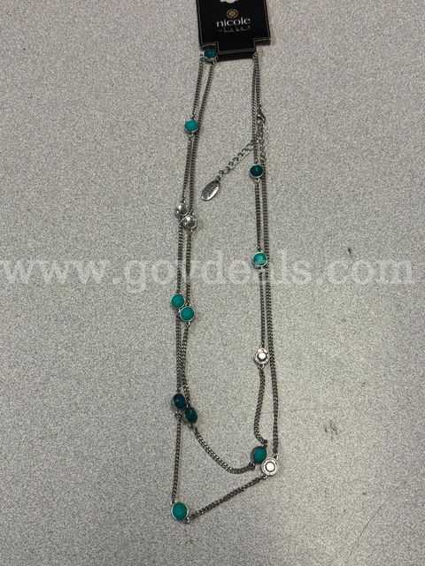 Necklace with green and clear stones