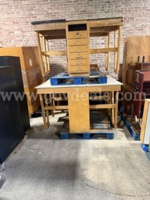 Five Wooden seven drawer work desk.