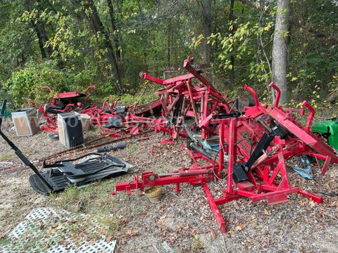 Lot of 9 mower decks -- blades and other parts missing -- with various frames