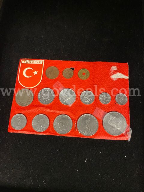 Cardboard Display of Turkiye Coins and 1 Greenbrier Coin from Room Key