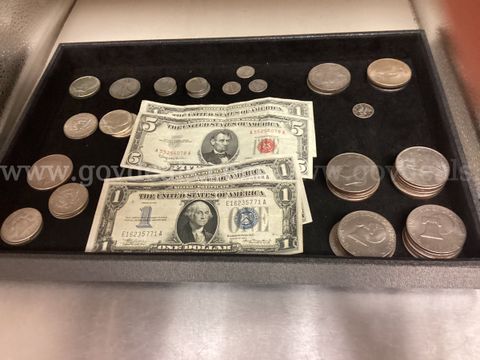 Two One-Dollar Silver Certificates with Blue Seal and Various Coins