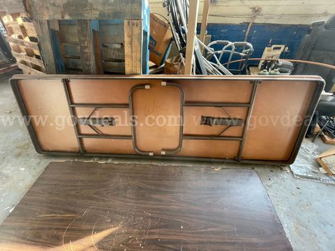 Three tables in total: two 8ft one 6 ft folding tables