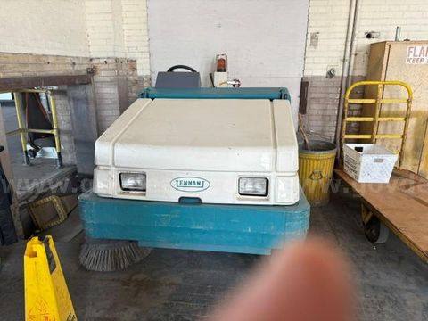 Tennant Sweeper Scrubber, a heavy-duty commercial and industrial floor cleaning machine