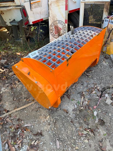 Skid steer dual discharge concrete mixer