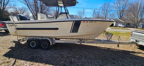 Edgewater Boat, Mercury Motor and Float-On Trailer