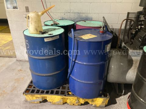 Lot of 9 55gallon Drums containing gear oil and brake flush