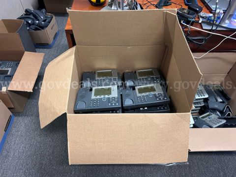 One (1) LOT of 70 Cisco IP Phones various models' w/ Handsets & Cables.
