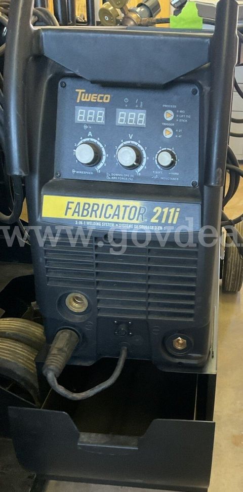 Tweco Fabricator 211i 3-in-1 Welding System mounted on a Thermal Arc cart, with leads, torch, and accessories.