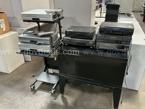 5 - VHS and 3 - VCR/DVD Players w/Cart.