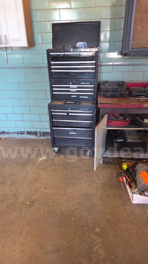 Craftsman toolbox and a workbench