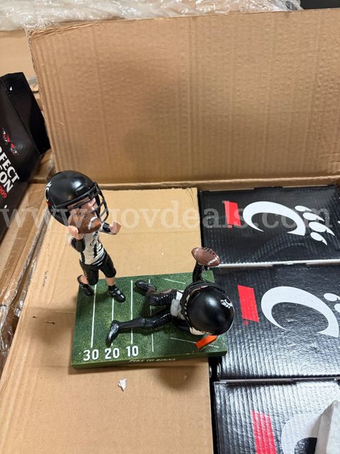 Lot of 12 Retired UC Football Bobbleheads