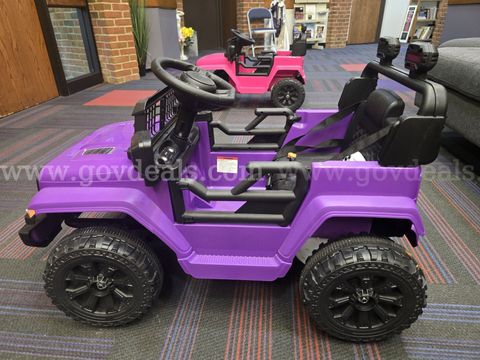 Child's electric jeep purple