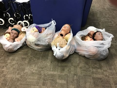 4 bags of manikin heads