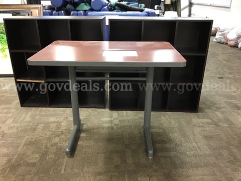 1 student desk and 2 cubed shelves