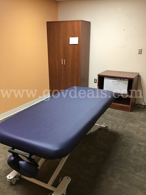 1 Electric massage bed, storage cabinet and a warmer with cabinet