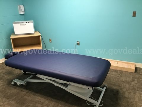 1 Electric massage bed, warmer with cabinet and a decorative sand box