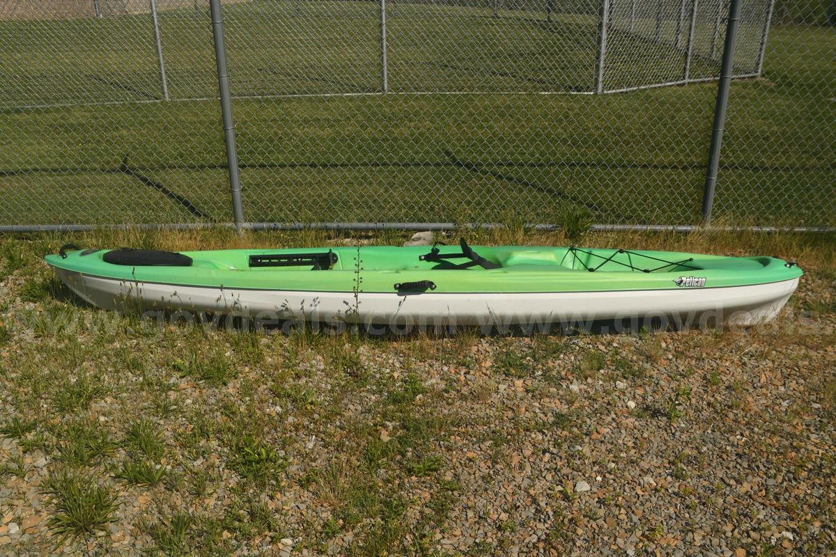 1 green Pelican kayak