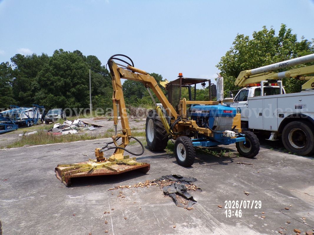 1985 Ford 6610 Tractor with Hydraulic Boom Mower Attachment