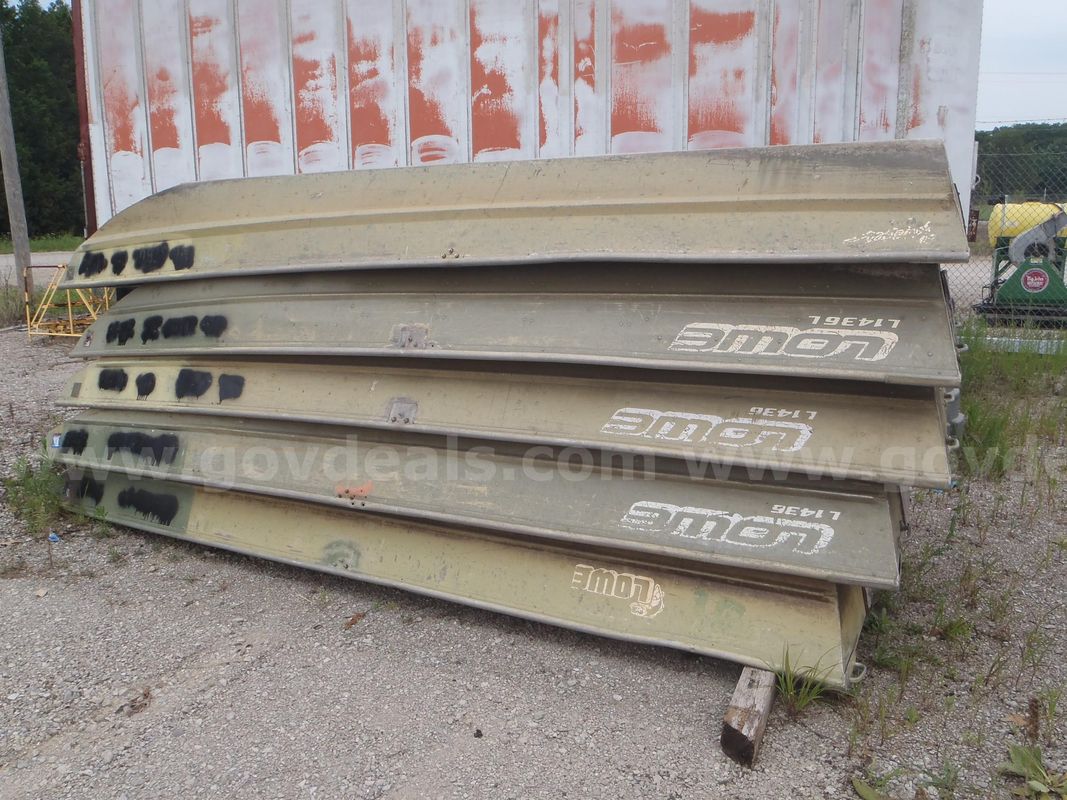 10 flat bottom John boats used, sold together
