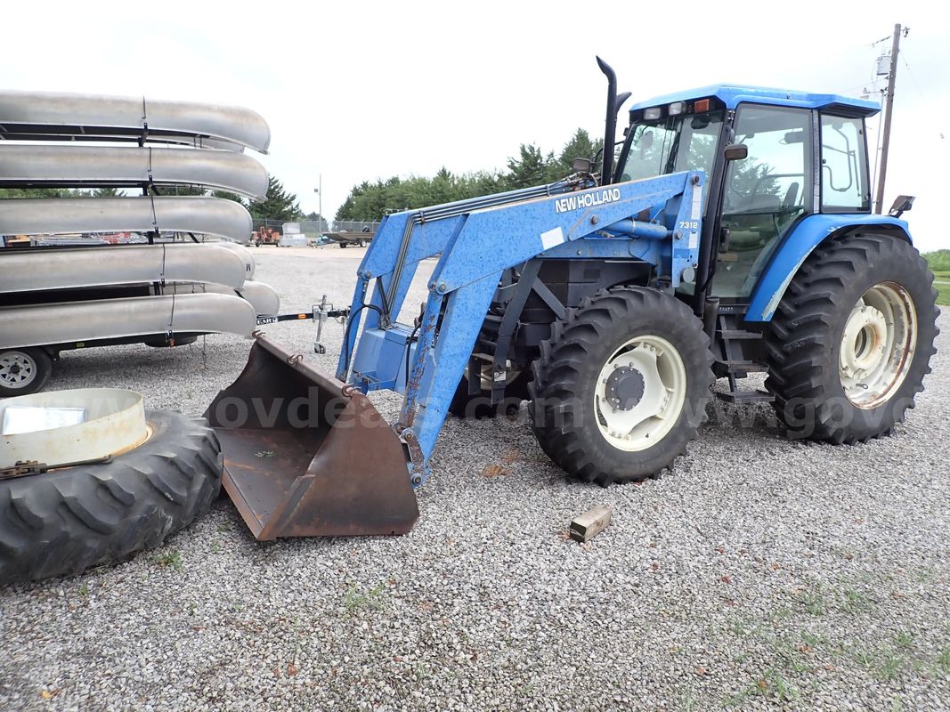 01 new holland 110hp with loader and one dual
