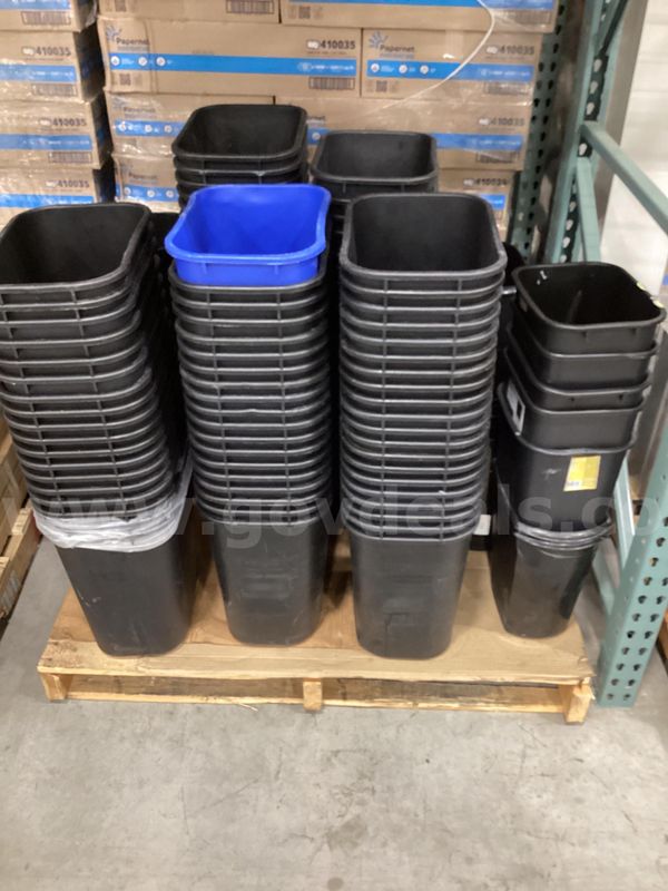 Pallet of garbage cans