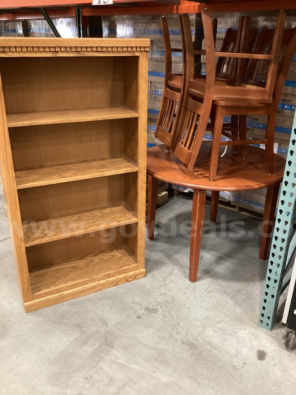 Table, chairs, and a bookcase