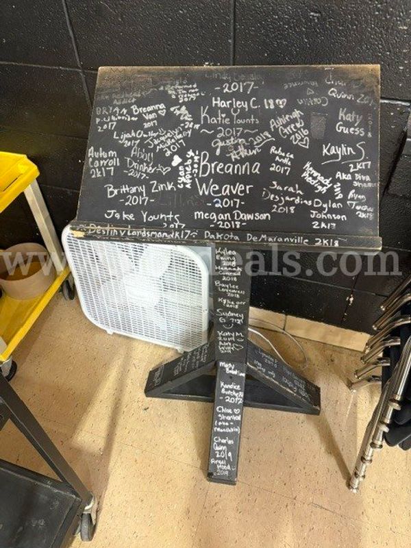 We have a school podium that was signed by former students. It is up for bid as is.