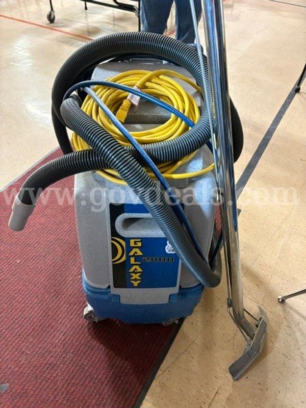 This is a used carpet cleaner sold as is