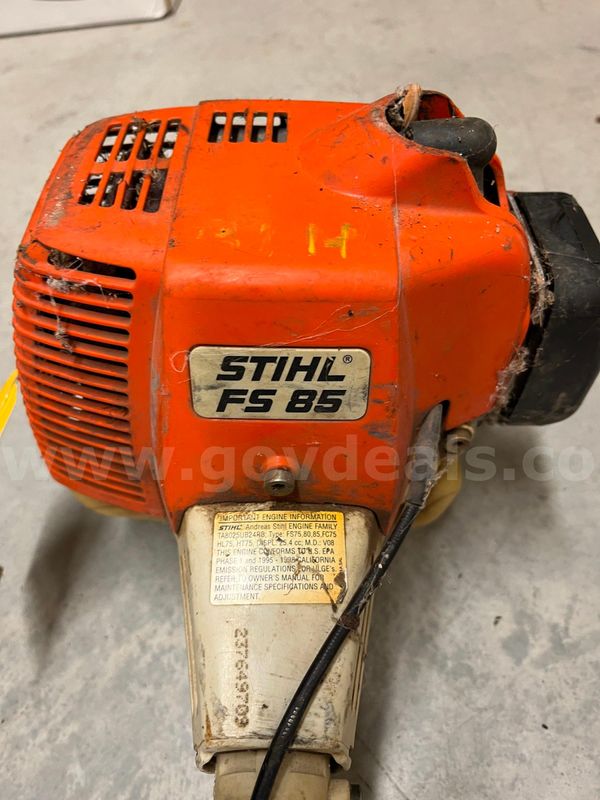 Lot of various brands of chainsaws, hedge trimmer, and string trimmer