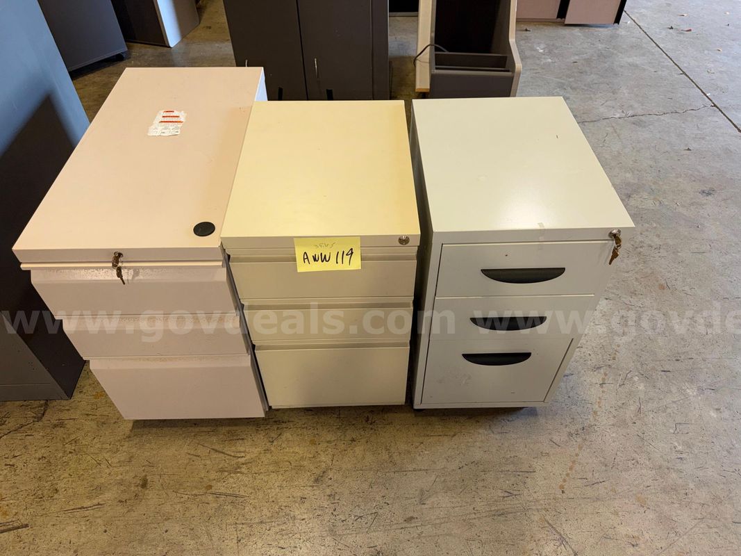 Three short file cabinets, tan