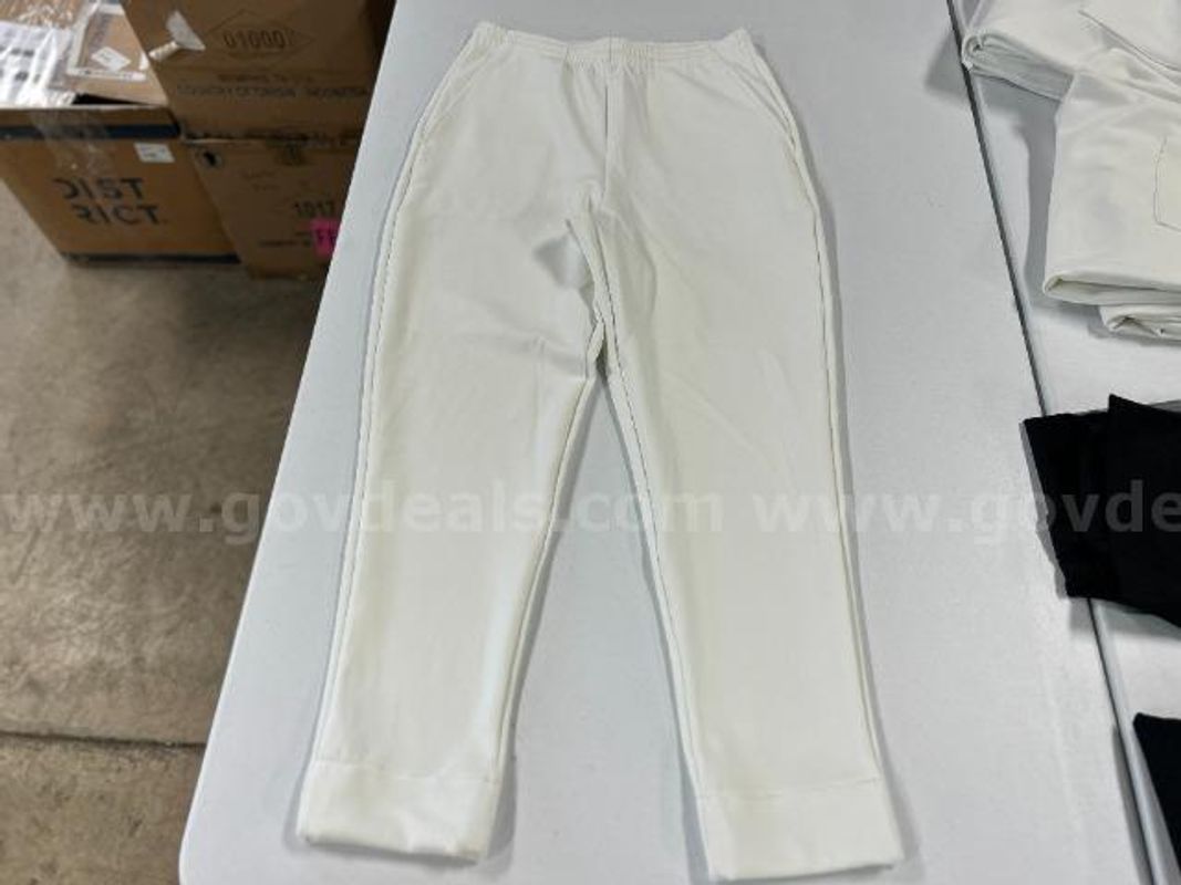 Lot of 2, Varsity Spirit Sweatpants. Off-White in color. Size: M