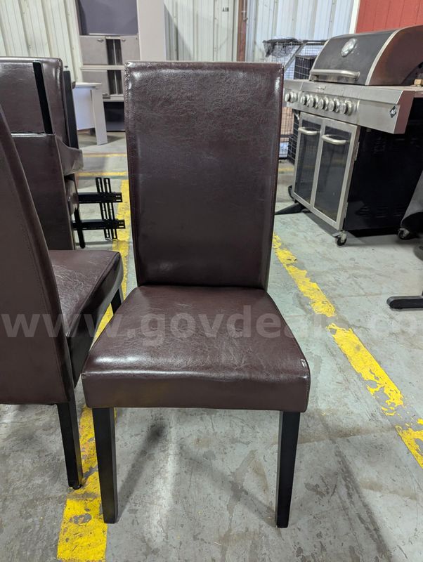 Set of 8 used brown dining/side chairs.