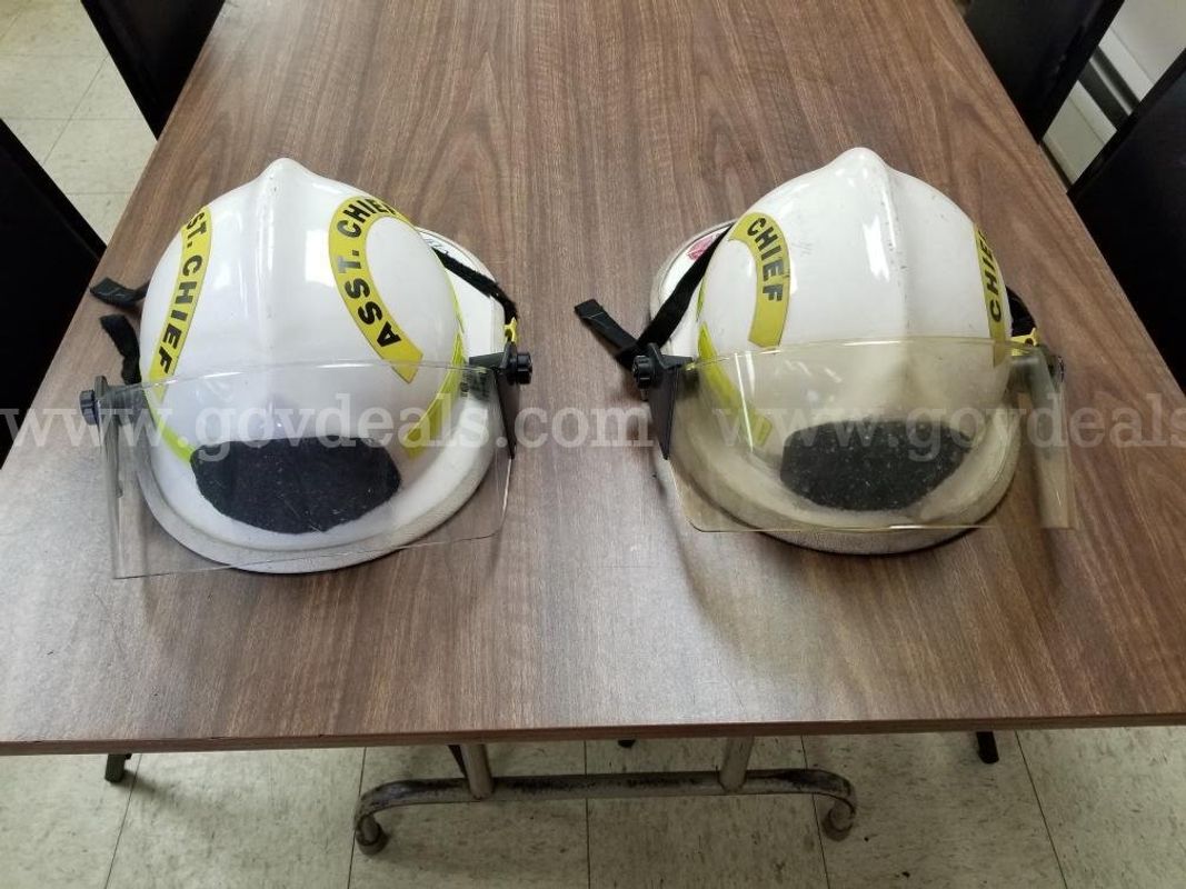 (2) White Cairns Helmets