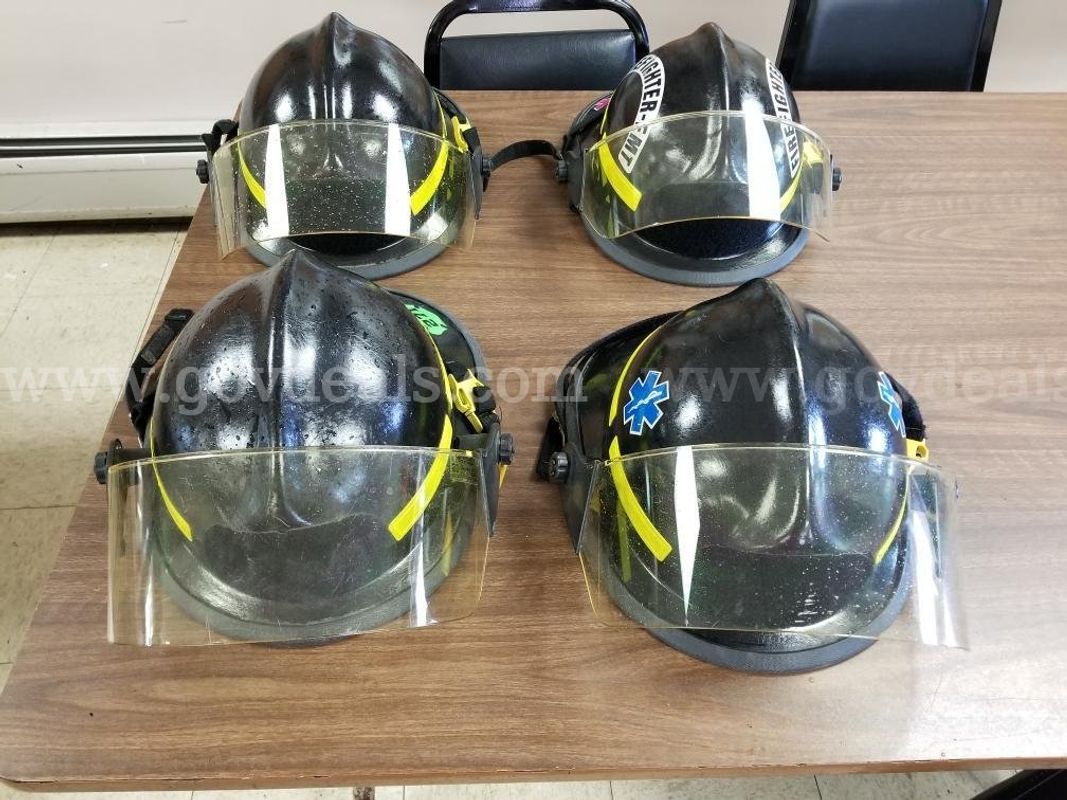 (4) Black Cairns Helmets