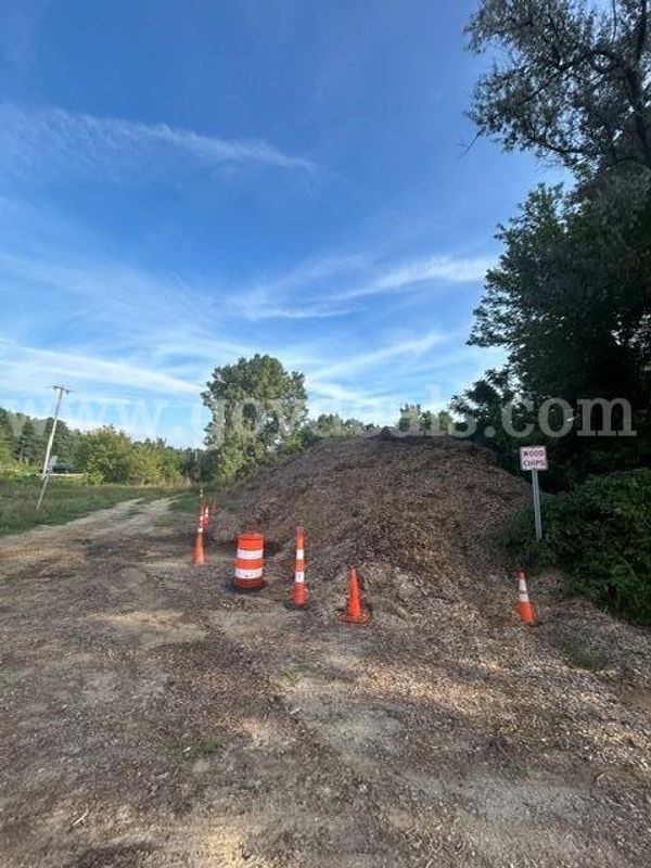 Approximately 788 cubic yards of wood chips located at 11750 Bunkerhill (M-106). We will not load.