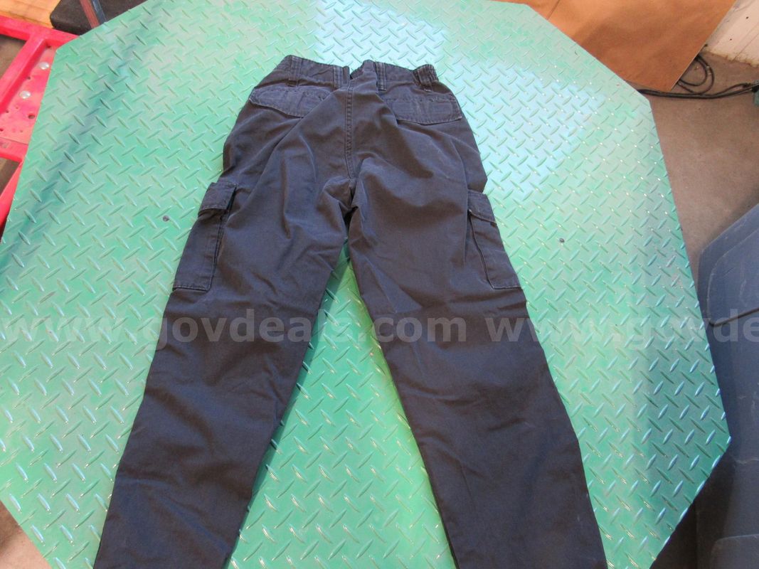 Several Bags of Black Uniform Pants