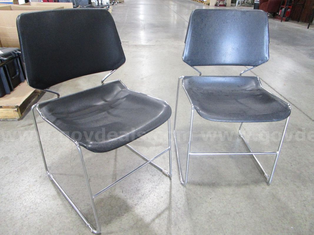 2 Black Stackable Chairs (I)