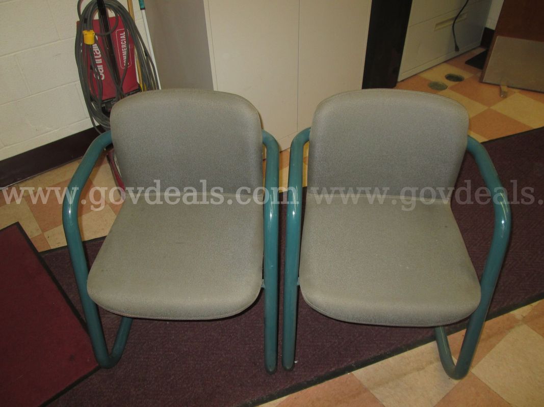 A lot of two green chairs