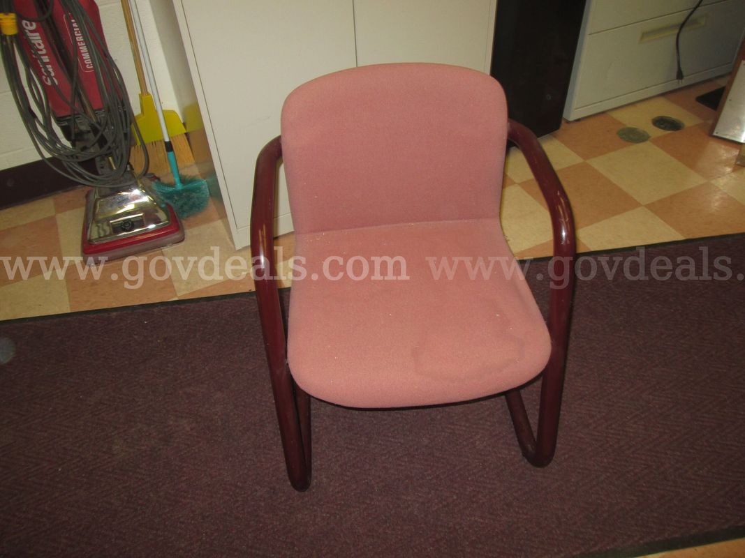 A lot of four red chairs