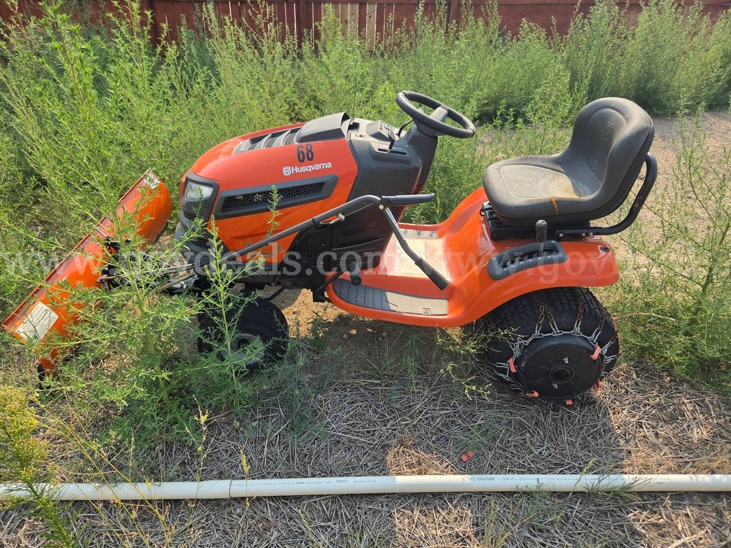 Husqvarna Riding Lawn Tractor with Snow Plow & Tire Chains – Condition Unknown