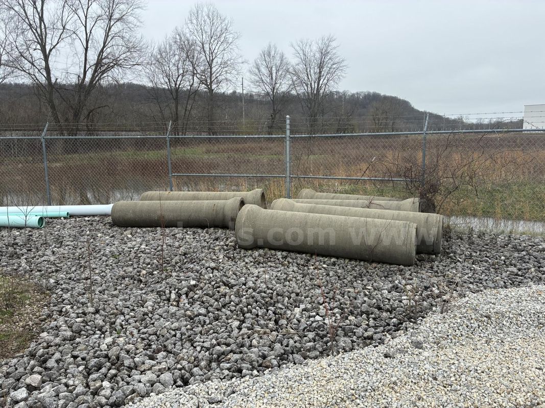 Reinforced Concrete Pipe (RCP) 15" and 18" Inside Diameter and Concrete Catch Basin and Risers.