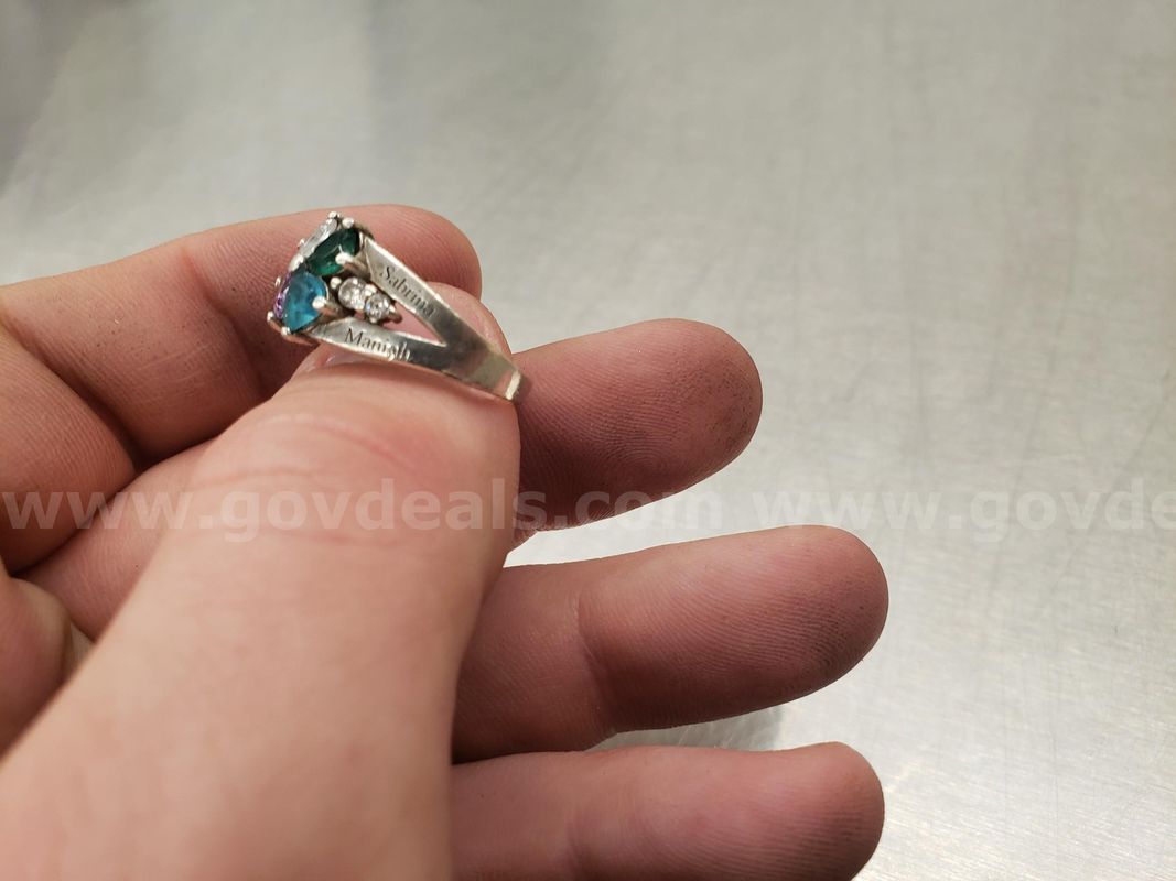 Silver in color birth stone ring