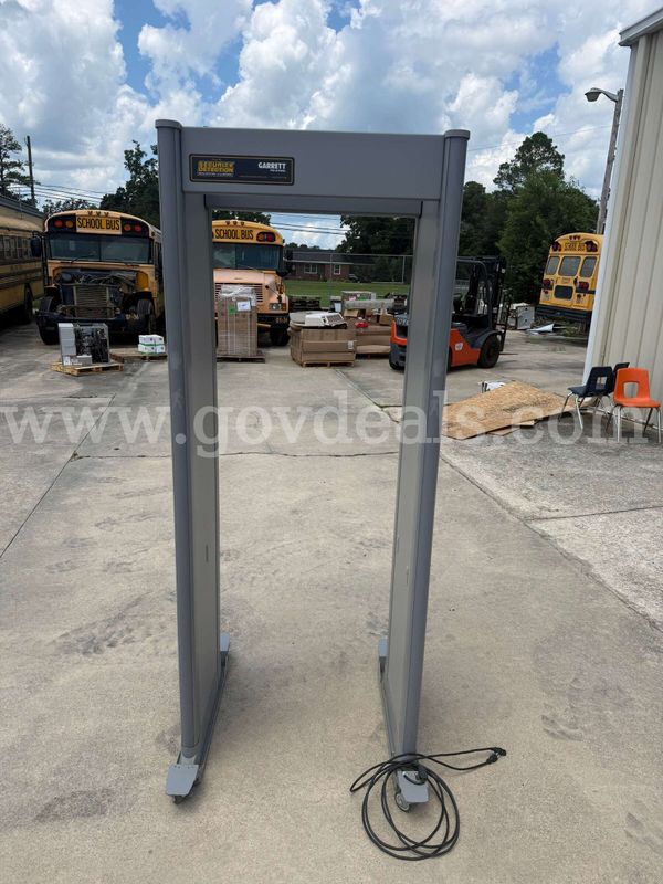 Lot of 4 Garrett PD 6500i Walk-Through Metal Detectors with rolling base
